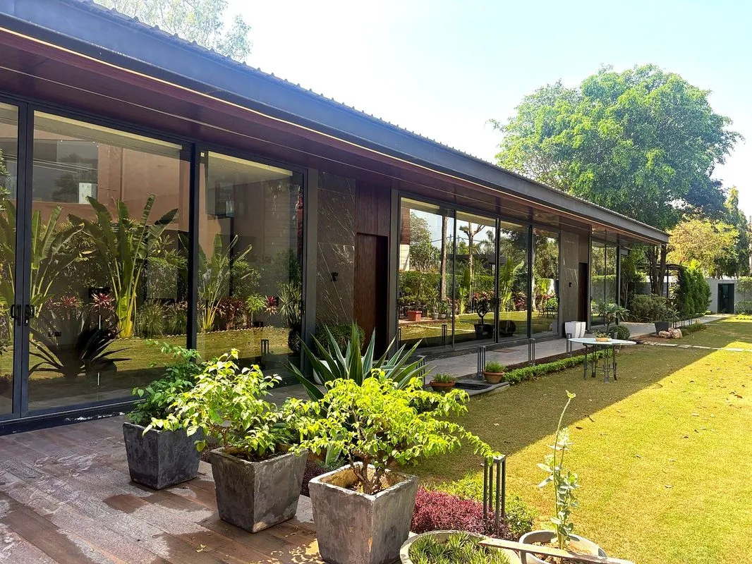 Sainik Farms luxury farmhouse extension, South Delhi — hero exterior view by Spatial Genesis